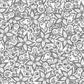 Doodled seamless vector pattern from flowers. Endless vector background nature theme.