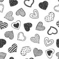Doodles hearts seamless pattern. Hand drawn sketchy romantic monochrome background for Valentines Day design, wrapping Royalty Free Stock Photo