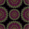 Doodles mandala seamless pattern background.