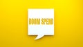 Doom spend text message on speech bubble.Yellow background Royalty Free Stock Photo