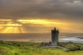 Doonagore castle at sunset in Ireland.