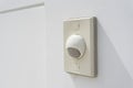 Door bell on brown wall background. Royalty Free Stock Photo