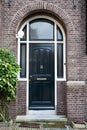 Door with brick wall