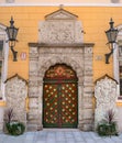 The door of the Brotherhood of blackheads in Tallinn. Estonia. On the door is the coat of Arms of the Guild of Royalty Free Stock Photo