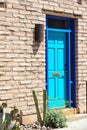 A door, colorfully painted, in the Tucson Arizona Barrio district Royalty Free Stock Photo