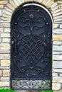 Door decoration with ornate wrought-iron elements, close up