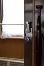 Door and doorknob in a train compartment. Travel by train. Royalty Free Stock Photo