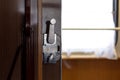 Door and doorknob in a train compartment. Travel by train. Royalty Free Stock Photo