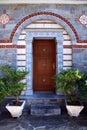 Door entrance in ornate stone house(Greece) Royalty Free Stock Photo