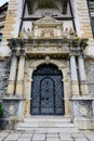 Door at the entry to the beautiful neo-Renaissance building of Peles Castle Castelul Peles near Bucegi Mountains Muntii Bucegi Royalty Free Stock Photo