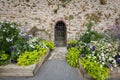 Door and flowers on the promenade Clair de lune in Dinard Royalty Free Stock Photo