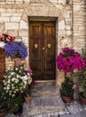 Door with flowers in Spello - HDR Royalty Free Stock Photo