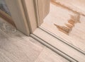 Door frame. threshold of a white interroom wooden door. linoleum Royalty Free Stock Photo