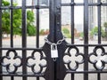 Door gate with silver chain lock Royalty Free Stock Photo