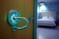 door handle with bacteria animation in a hospital setting