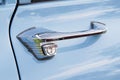 Door handle of a blue vintage car Royalty Free Stock Photo