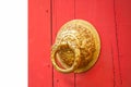 door handle made from golden metal on the red door Old Chinese style Royalty Free Stock Photo