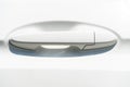 Door handle of white car. Royalty Free Stock Photo