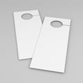 Door hanger white tags for room in hotel, resort, home isolated on grey background for design template and mock up. 3d rende Royalty Free Stock Photo