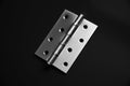 Door hinges, hold the door, on a black background Royalty Free Stock Photo