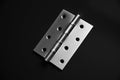 Door hinges, hold the door, on a black background Royalty Free Stock Photo
