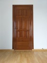 Door interroom from a pine with the bronze handle Royalty Free Stock Photo