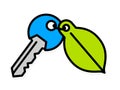 Door key with a green environment leaf tag Royalty Free Stock Photo