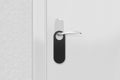 Door knob with blank black doorhanger mock up, 3d illustration