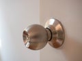 Door knob,On wood white door,Material Stainless,Beautiful lighting,Sunlight,Security lock,Closeup detail