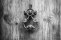Door Knocker on allwood door in Siena, Tuscany Royalty Free Stock Photo