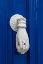 Door knocker in the mountain village of Pirgos on Tinos Royalty Free Stock Photo