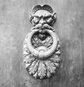 Door Knockers close up on a door, Siena, Tuscany, Italy (black and White) Royalty Free Stock Photo