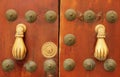 A pair of hand shaped door knockers