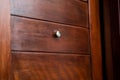 Door lens peephole security on wooden texture