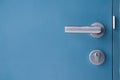 Door lock on blue door background. Royalty Free Stock Photo