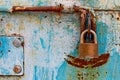 Door lock for key closing, keyhole, hasp bolt. Collection of old vintage retro locks on the textured colored door. Close-up