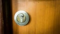 A door lock with wooden door and metal locks