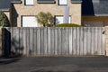 Door long wooden gate facade in street view outdoor home portal entrance