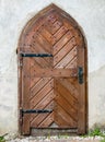 Door from a medieval old buliding. Closed wooden door Royalty Free Stock Photo