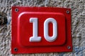 Door number 10 on concrete background Royalty Free Stock Photo