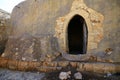 door of an old house built of cement and stones