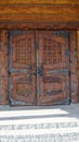door. old wooden Front Door of a Traditional European Town House. Big Double Arch Door Royalty Free Stock Photo