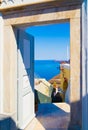 door open with sea view, from a courtyard in Santorini, Greece Royalty Free Stock Photo