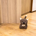 Door open stand dog toy Royalty Free Stock Photo