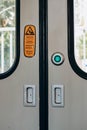 Door opening button on the SNCF train Royalty Free Stock Photo