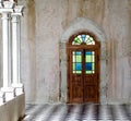 Door with pillar in daylight