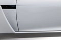 The door of a powerful white sports car. closeup of a Jaguar F-type hood Royalty Free Stock Photo