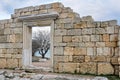 Door in the ruins of antique temple by the sea schore Royalty Free Stock Photo