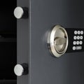 The door of the safe for money with a digital lock