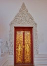 Door and sculpture caved in temple Thailand Royalty Free Stock Photo